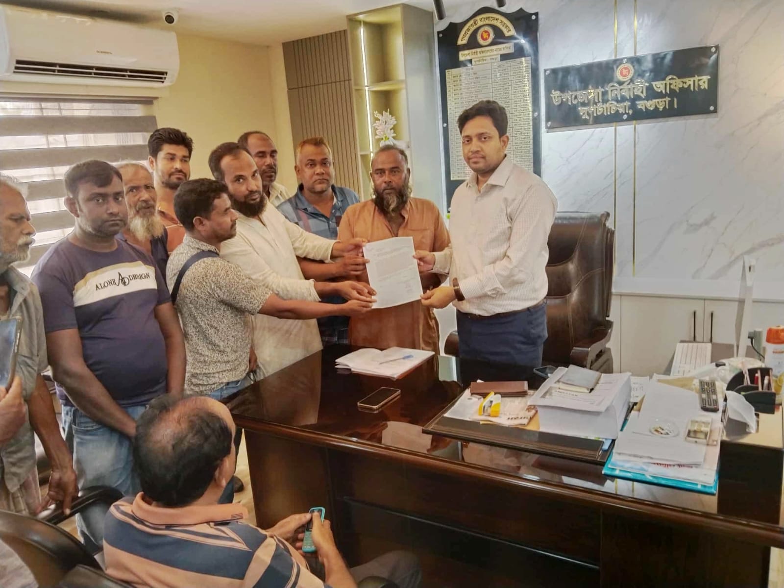 দুপচাঁচিয়ায় দোকান ঘর নির্মাণ পূর্বক ব্যবসা করার অনুমতির জন্য ইউনও’র নিকট আবেদন
