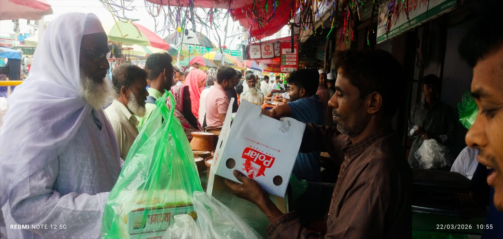 দুপচাঁচিয়ায় দই ও মিষ্টির দোকানগুলোতে ক্রেতাদের উপচে পড়া ভিড়