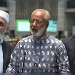 কোরআনের আয়াত নিয়ে সংসদে বিতর্ক
